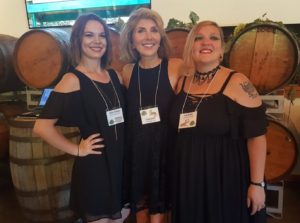 Three communications ladies at Sipping for Sanctuary