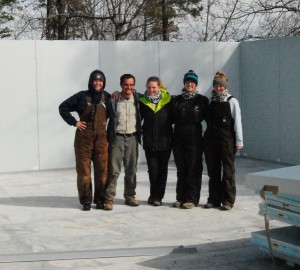 A handful of interns pause from preparing food for the animals to show off the new freezer being built for TCWR. It will hold up to eight week's food when finished later this month.